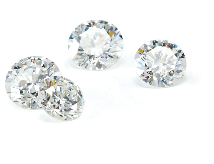 four loose sparkling lab-created diamonds sold by Thurber Armstrong Private Jewelers in Tampa